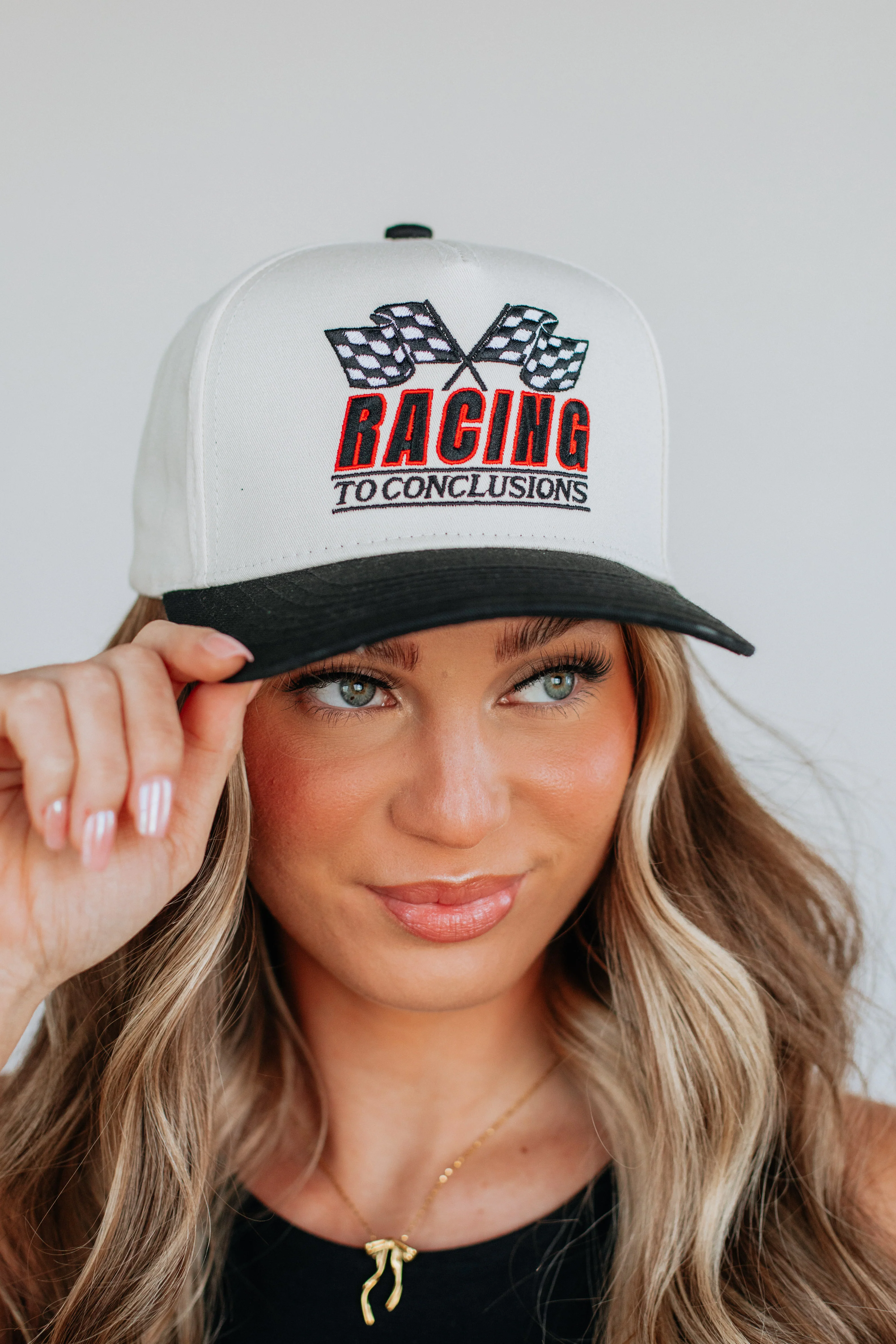 Racing To Conclusions Trucker Hat
